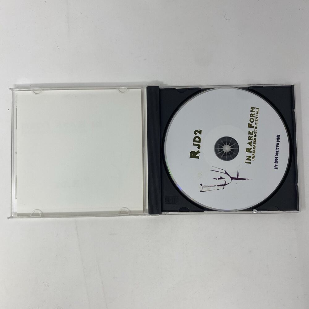 RJD2 ‎– In Rare Form (Unreleased Instrumentals) CD 2004 - Picture 3 of 4